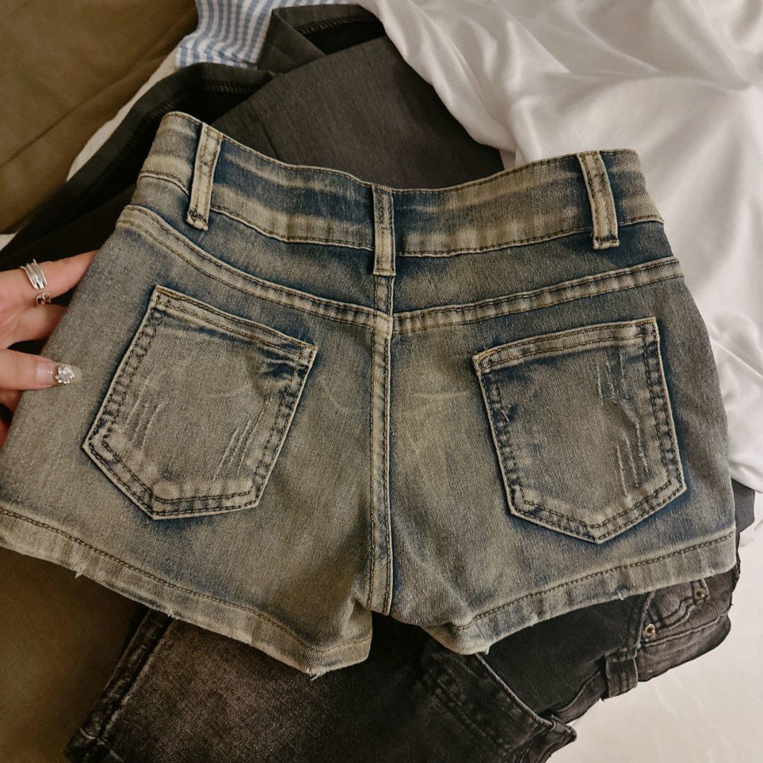Pantaloncini con borchie