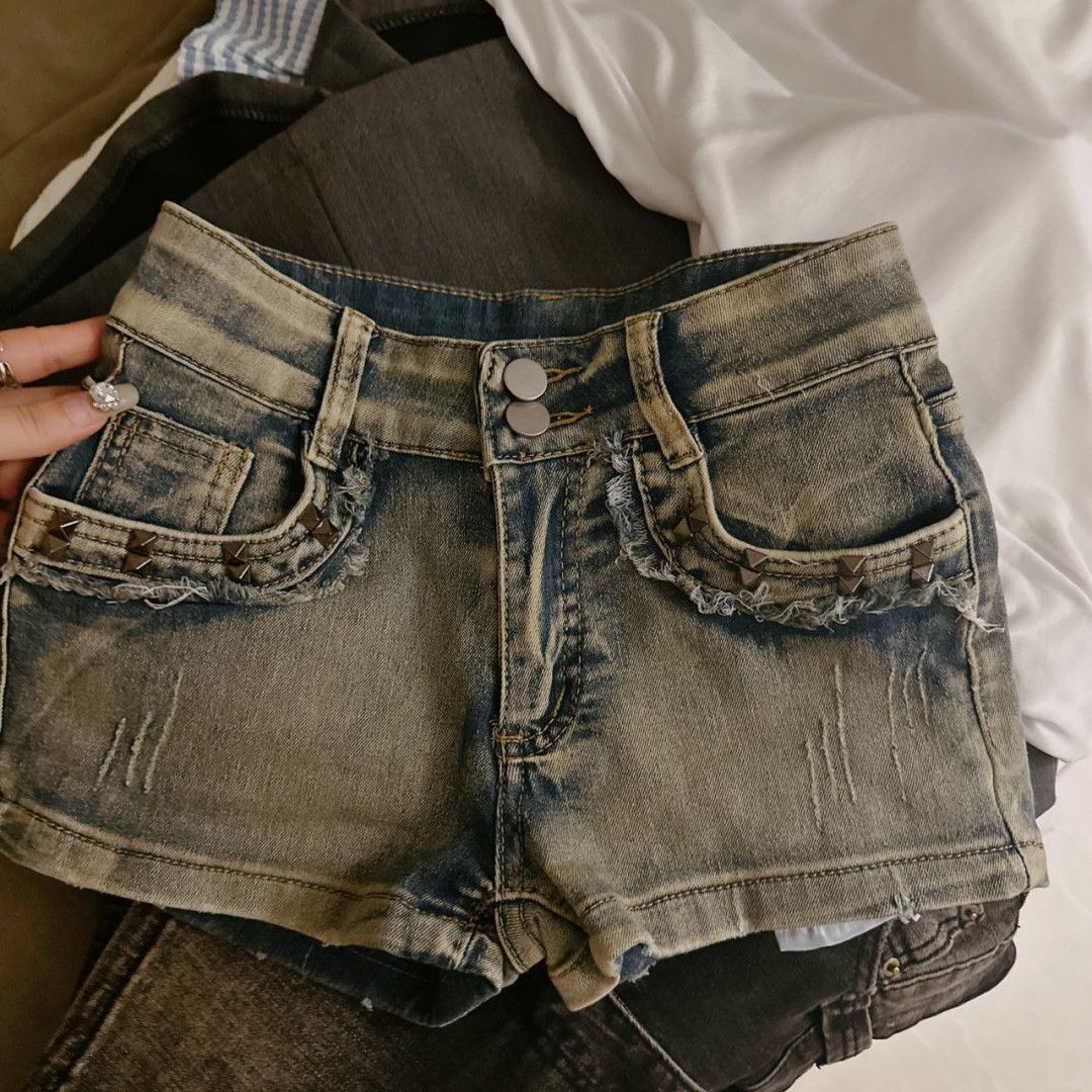 Pantaloncini con borchie