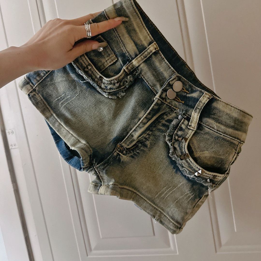 Pantaloncini con borchie