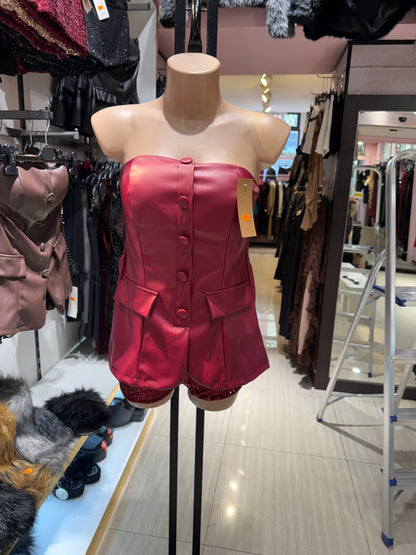 Vestitino in pelle con bottoni