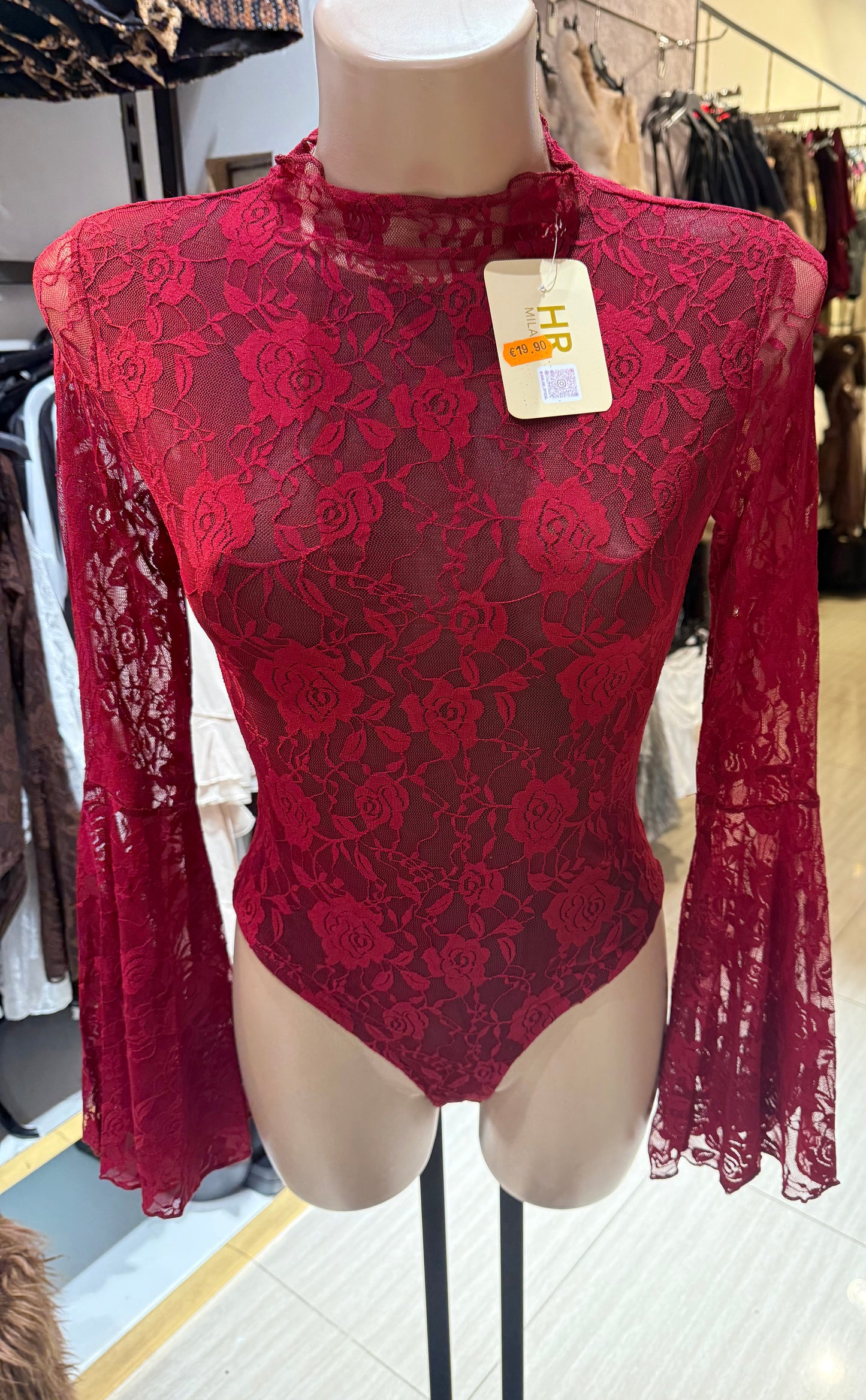 Top in pizzo a collo alto con maniche lunghe