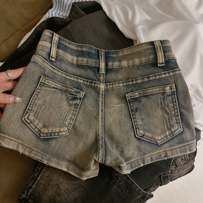 Pantaloncini con borchie